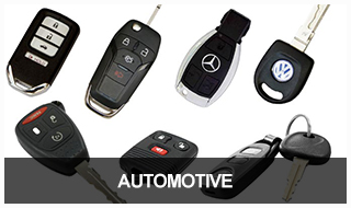 Image of a variety of car keys, fobs, and remotes